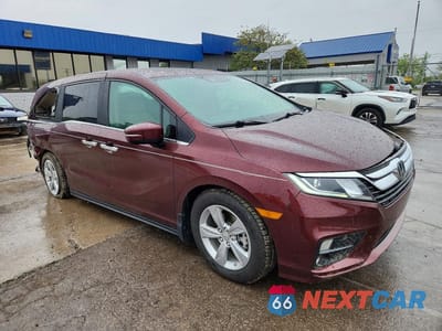 Czwarte zdjęcie samochodu z boku: 2018 HONDA ODYSSEY EXL VIN:5FNRL6H7XJB027387 - miniatura