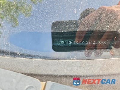 Zdjęcie 12 z 12 samochodu: 2012 MAZDA MAZDA2 VIN:JM1DE1KYXC0141559 - miniatura