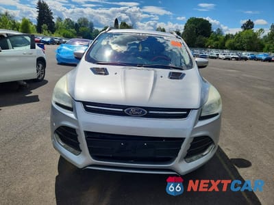 Piąte zdjęcie samochodu w środku: 2016 FORD ESCAPE TITANIUM VIN:1FMCU0J99GUA04139 - miniatura