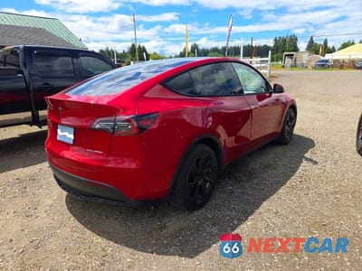 Czwarte zdjęcie samochodu z boku: 2021 TESLA MODEL Y VIN:5YJYGDEE4MF233509 - miniatura