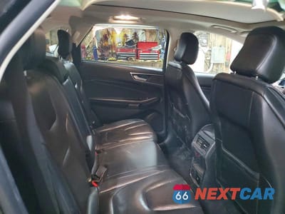 Zdjęcie 11 z 14 samochodu: 2020 FORD EDGE TITANIUM VIN:2FMPK4K92LBA56466 - miniatura
