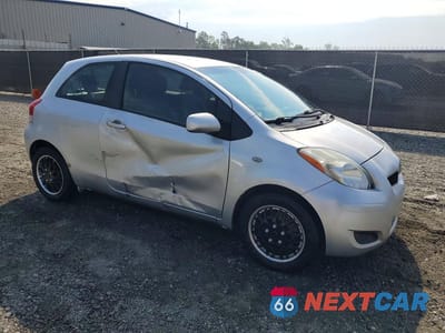Czwarte zdjęcie samochodu z boku: 2010 TOYOTA YARIS BASE VIN:JTDJT4K32A5296525 - miniatura