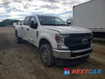 Czwarte zdjęcie samochodu z boku: 2021 FORD F350 SUPER DUTY VIN:1FT8W3BT3MED04880 - miniatura