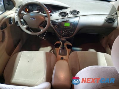 Zdjęcie 8 z 12 samochodu: 2003 FORD FOCUS SE VIN:1FAFP36373W129949 - miniatura