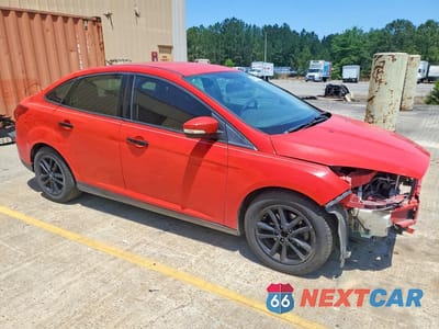 Czwarte zdjęcie samochodu z boku: 2016 FORD FOCUS SE VIN:1FADP3F28GL393459 - miniatura