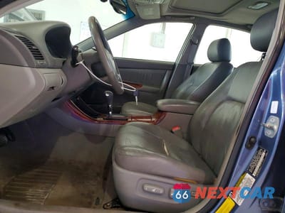 Zdjęcie 7 z 12 samochodu: 2004 TOYOTA CAMRY XLE VIN:4T1BE30K64U817478 - miniatura