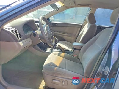Zdjęcie 7 z 12 samochodu: 2004 TOYOTA CAMRY LE VIN:4T1BE32K54U813533 - miniatura