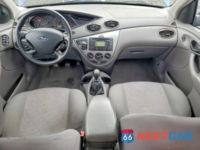 Zdjęcie 8 z 12 samochodu: 2004 FORD FOCUS ZX5 VIN:3FAFP37304R112400 - miniatura