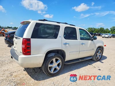 Trzecie zdjęcie samochodu z tyłu: 2011 CHEVROLET TAHOE VIN:1GNSKCE03BR134617 - miniatura