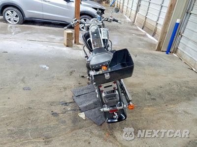 Czwarte zdjęcie samochodu z boku: 2005 SUZUKI C90 VIN:JS1VY52A152104987 - miniatura