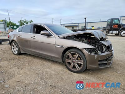 Czwarte zdjęcie samochodu z boku: 2017 JAGUAR XE PRESTIGE VIN:SAJAK4BN0HA971666 - miniatura
