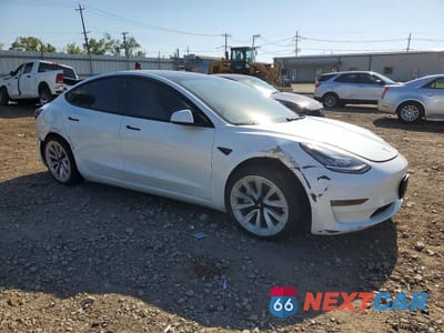 Czwarte zdjęcie samochodu z boku: 2021 TESLA MODEL 3 VIN:5YJ3E1EB4MF862501 - miniatura