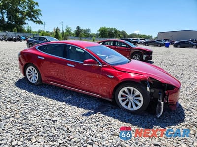 Czwarte zdjęcie samochodu z boku: 2016 TESLA MODEL S VIN:5YJSA1E40GF163542 - miniatura