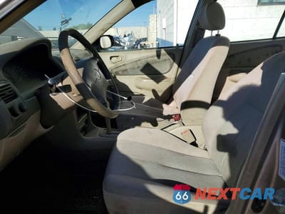 Zdjęcie 7 z 12 samochodu: 1999 TOYOTA COROLLA VE VIN:1NXBR12E6XZ242979 - miniatura