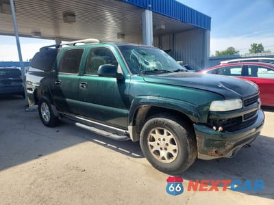 Czwarte zdjęcie samochodu z boku: 2002 CHEVROLET SUBURBAN K1500 VIN:3GNFK16Z32G314294 - miniatura