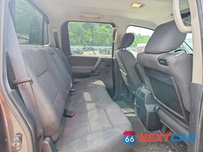 Zdjęcie 10 z 12 samochodu: 2012 NISSAN TITAN SV VIN:1N6BA0ED4CN317799 - miniatura
