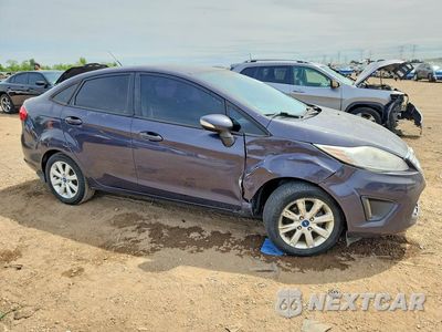 Czwarte zdjęcie samochodu z boku: 2013 FORD FIESTA SE VIN:3FADP4BJ4DM175497 - miniatura