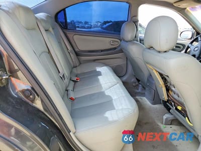 Zdjęcie 10 z 12 samochodu: 2000 NISSAN MAXIMA GXE VIN:JN1CA31AXYT013631 - miniatura