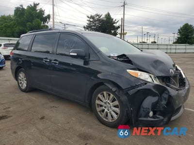 Czwarte zdjęcie samochodu z boku: 2014 TOYOTA SIENNA LIMITED 7-PASSENGER VIN:5TDYK3DC5ES430419 - miniatura