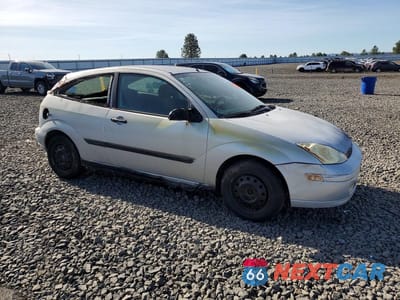 Czwarte zdjęcie samochodu z boku: 2001 FORD FOCUS ZX3 VIN:3FAFP313X1R139804 - miniatura