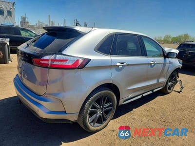 Trzecie zdjęcie samochodu z tyłu: 2022 FORD EDGE ST VIN:2FMPK4J93NBA50955 - miniatura