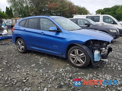 Czwarte zdjęcie samochodu z boku: 2016 BMW X1 XDRIVE28I VIN:WBXHT3C32G5E47949 - miniatura