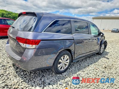 Trzecie zdjęcie samochodu z tyłu: 2017 HONDA ODYSSEY EXL VIN:5FNRL5H62HB014676 - miniatura