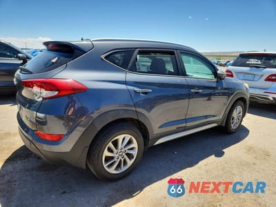 Trzecie zdjęcie samochodu z tyłu: 2017 HYUNDAI TUCSON SE VIN:KM8J33A45HU375199 - miniatura
