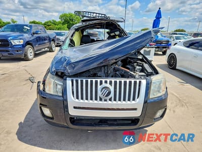Piąte zdjęcie samochodu w środku: 2010 MERCURY MARINER PREMIER VIN:4M2CN9H70AKJ04623 - miniatura