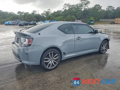 Trzecie zdjęcie samochodu z tyłu: 2016 SCION TC BASE VIN:JTKJF5C72GJ023365 - miniatura