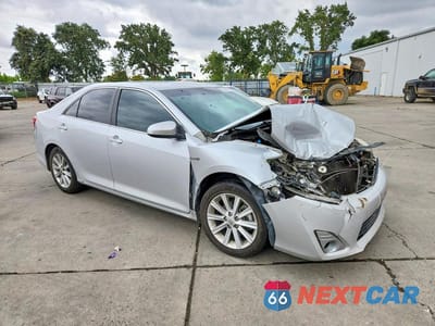 Czwarte zdjęcie samochodu z boku: 2012 TOYOTA CAMRY HYBRID XLE VIN:4T1BD1FKXCU034564 - miniatura