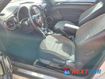 Zdjęcie 7 z 13 samochodu: 2016 VOLKSWAGEN BEETLE DUNE VIN:3VWS07AT2GM622100 - miniatura