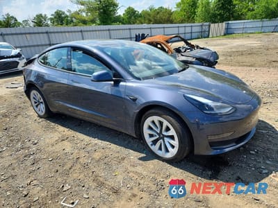 Czwarte zdjęcie samochodu z boku: 2023 TESLA MODEL 3 VIN:5YJ3E1EA3PF658283 - miniatura