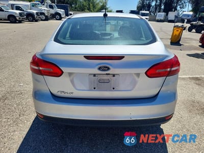 Zdjęcie 6 z 12 samochodu: 2016 FORD FOCUS S VIN:1FADP3E24GL405964 - miniatura