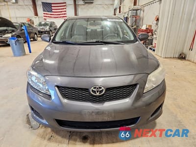 Piąte zdjęcie samochodu w środku: 2010 TOYOTA COROLLA LE VIN:1NXBU4EE9AZ318990 - miniatura