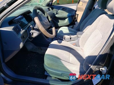 Zdjęcie 7 z 12 samochodu: 2001 TOYOTA CAMRY LE VIN:4T1BG22K61U868444 - miniatura