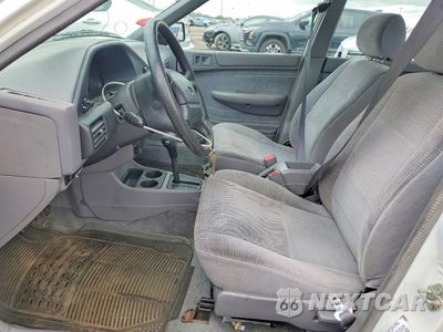 Zdjęcie 7 z 12 samochodu: 1995 FORD ESCORT LX VIN:3FASP13J2SR125587 - miniatura