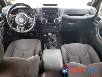 Zdjęcie 8 z 12 samochodu: 2014 JEEP WRANGLER UNLIMITED SPORT VIN:1C4BJWDGXEL267801 - miniatura