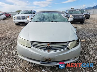 Piąte zdjęcie samochodu w środku: 2002 TOYOTA CAMRY SOLARA SE V6 VIN:2T1CF22P42C593386 - miniatura
