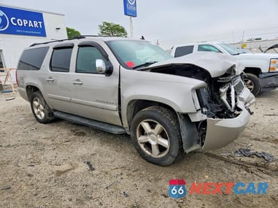 Czwarte zdjęcie samochodu z boku: 2007 CHEVROLET SUBURBAN C1500 VIN:1GNFC16067J178988 - miniatura