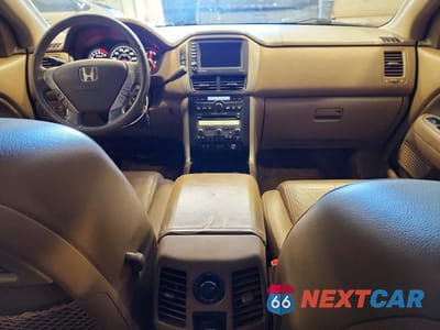 Zdjęcie 8 z 13 samochodu: 2006 HONDA PILOT EX VIN:2HKYF18716H557620 - miniatura
