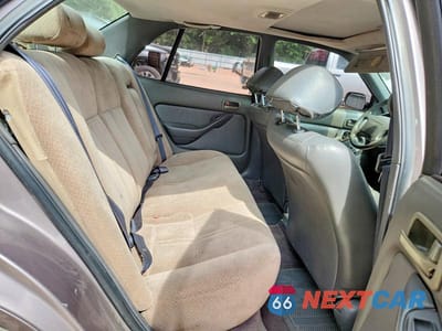 Zdjęcie 10 z 12 samochodu: 1996 TOYOTA CAMRY LE VIN:4T1BF12K3TU118760 - miniatura