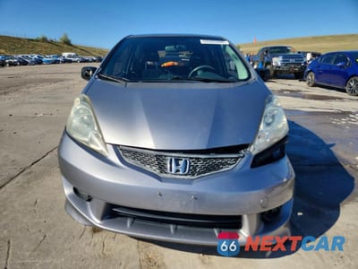 Piąte zdjęcie samochodu w środku: 2009 HONDA FIT SPORT VIN:JHMGE87419S000208 - miniatura