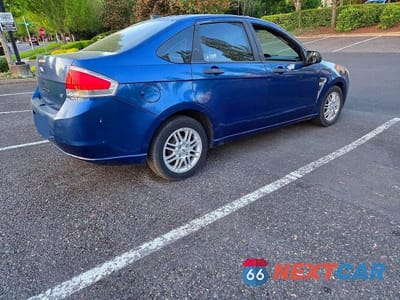 Czwarte zdjęcie samochodu z boku: 2009 FORD FOCUS SE VIN:1FAHP35N29W118507 - miniatura