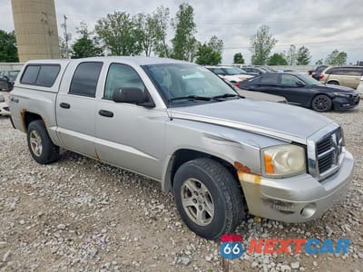 Czwarte zdjęcie samochodu z boku: 2007 DODGE DAKOTA QUAD SLT VIN:1D7HW48K27S128744 - miniatura