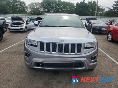 Piąte zdjęcie samochodu w środku: 2014 JEEP GRAND CHEROKEE OVERLAND VIN:1C4RJFCG7EC523022 - miniatura