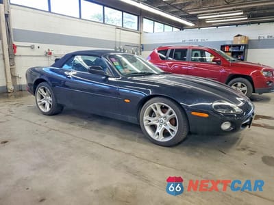 Czwarte zdjęcie samochodu z boku: 2003 JAGUAR XK8 VIN:SAJDA42C232A32507 - miniatura