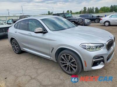 Czwarte zdjęcie samochodu z boku: 2020 BMW X4 XDRIVEM40I VIN:5UX2V5C02L9D17184 - miniatura