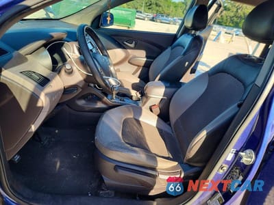 Zdjęcie 7 z 13 samochodu: 2011 HYUNDAI TUCSON GLS VIN:KM8JUCAC5BU243569 - miniatura