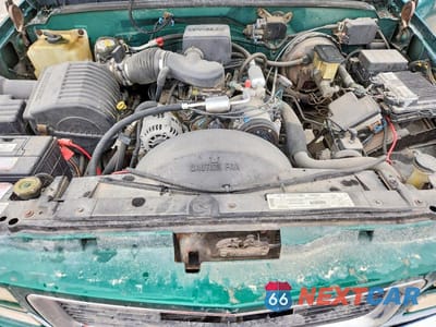 Zdjęcie 11 z 12 samochodu: 1999 GMC SIERRA K1500 VIN:1GTEK19R9XR502387 - miniatura